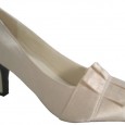 Dear Shoelady,
What color shoe would you suggest I wear with a red sequined dress to a black tie party. 
I was thinking nude color, I wear 10 wide, 2-2.5 inch heel. I am having problem finding one. Please help me.
Thank you
Lora

Lora -
I'm imagining that by black tie you mean a long dress?  That's what I'm visioning.  But, no matter, the answer is the same.  Silver fabric or silver toned metallic.  You don't want to call attention to your feet with such a bright dress.  Silver is a great "neutral" for red when you are getting dressy. <div class="addthis_toolbox addthis_default_style addthis_" addthis:url='http://asktheshoelady.com/2011/03/what-color-shoes-with-a-red-dress-for-evening/' addthis:title='What Color Shoes With a Red Dress for Evening?' ><a class="addthis_button_preferred_1"></a><a class="addthis_button_preferred_2"></a><a class="addthis_button_preferred_3"></a><a class="addthis_button_preferred_4"></a><a class="addthis_button_compact"></a></div>